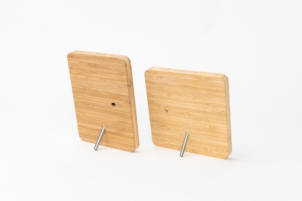 Back of 5×7 and 6×6 inch Bamboo Tabletop Frames to view Removable Metal Stand display hardware on a white background