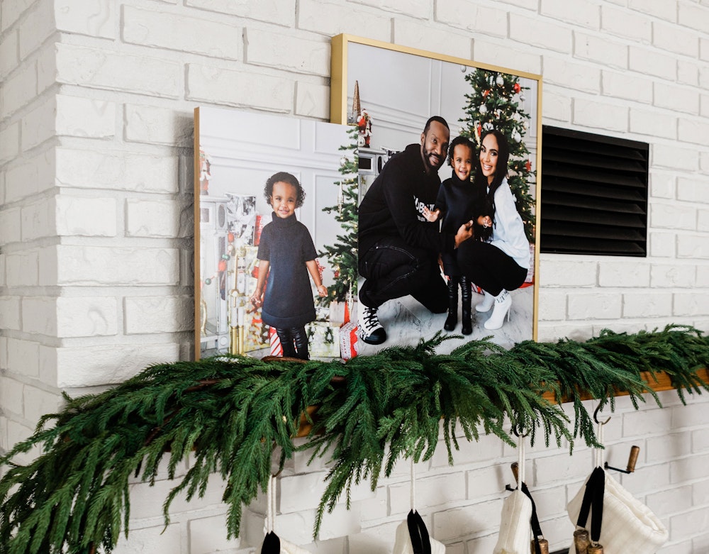 Bamboo Standout Paired with Modern Metal Gold Frame on Holiday Mantel with Greenery