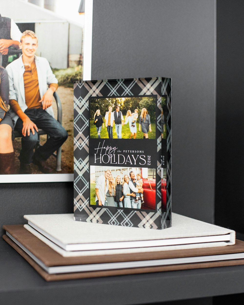Plaid designer Acrylic Block with family portraits on black shelf