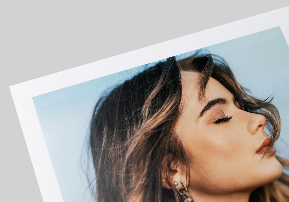 Close-up of a portrait printed on Press Semi Gloss paper, showcasing a smooth surface and subtle sheen.