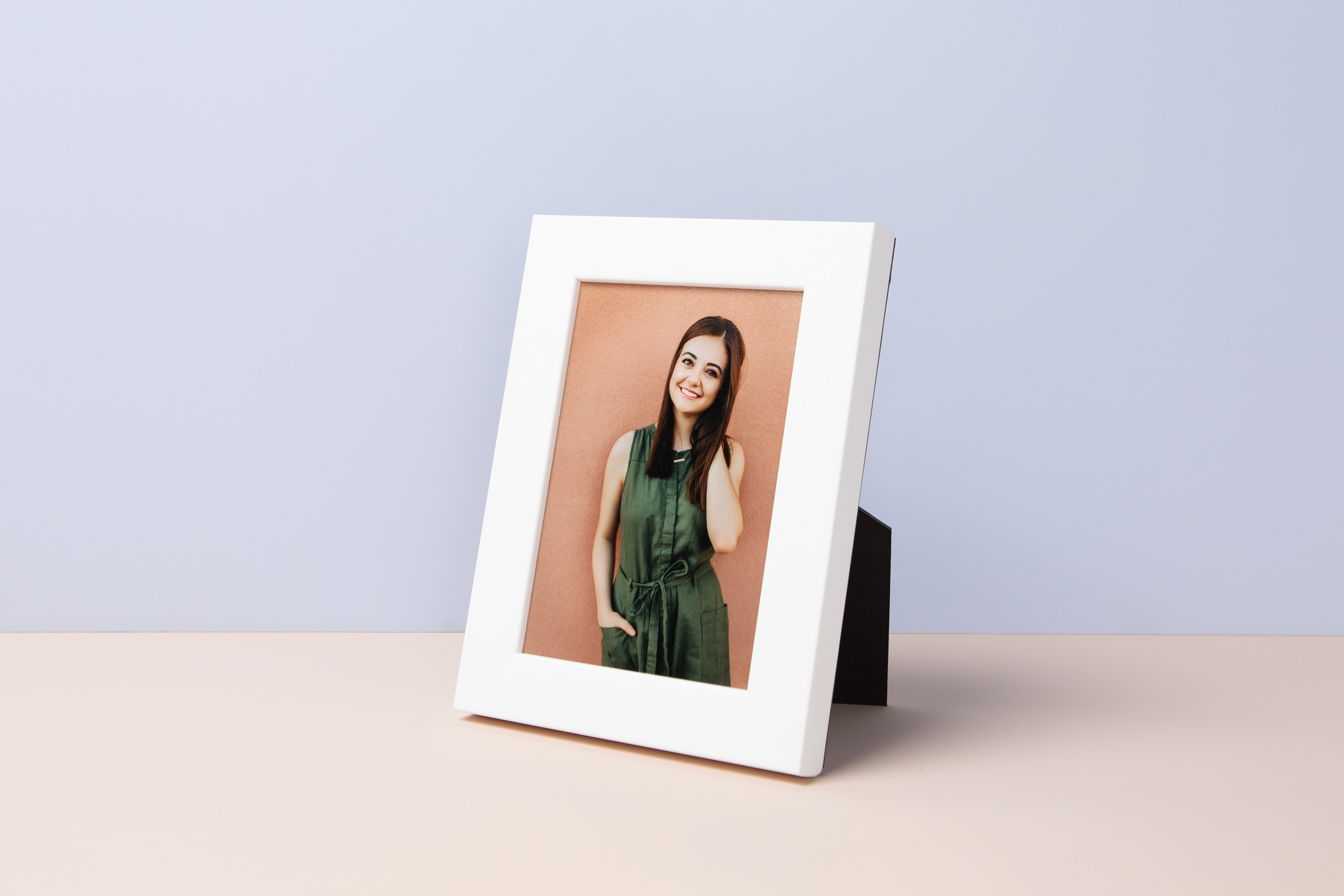 Professional senior portrait printed in a small, Gallery White Tabletop Framed Print with easel back display hardware