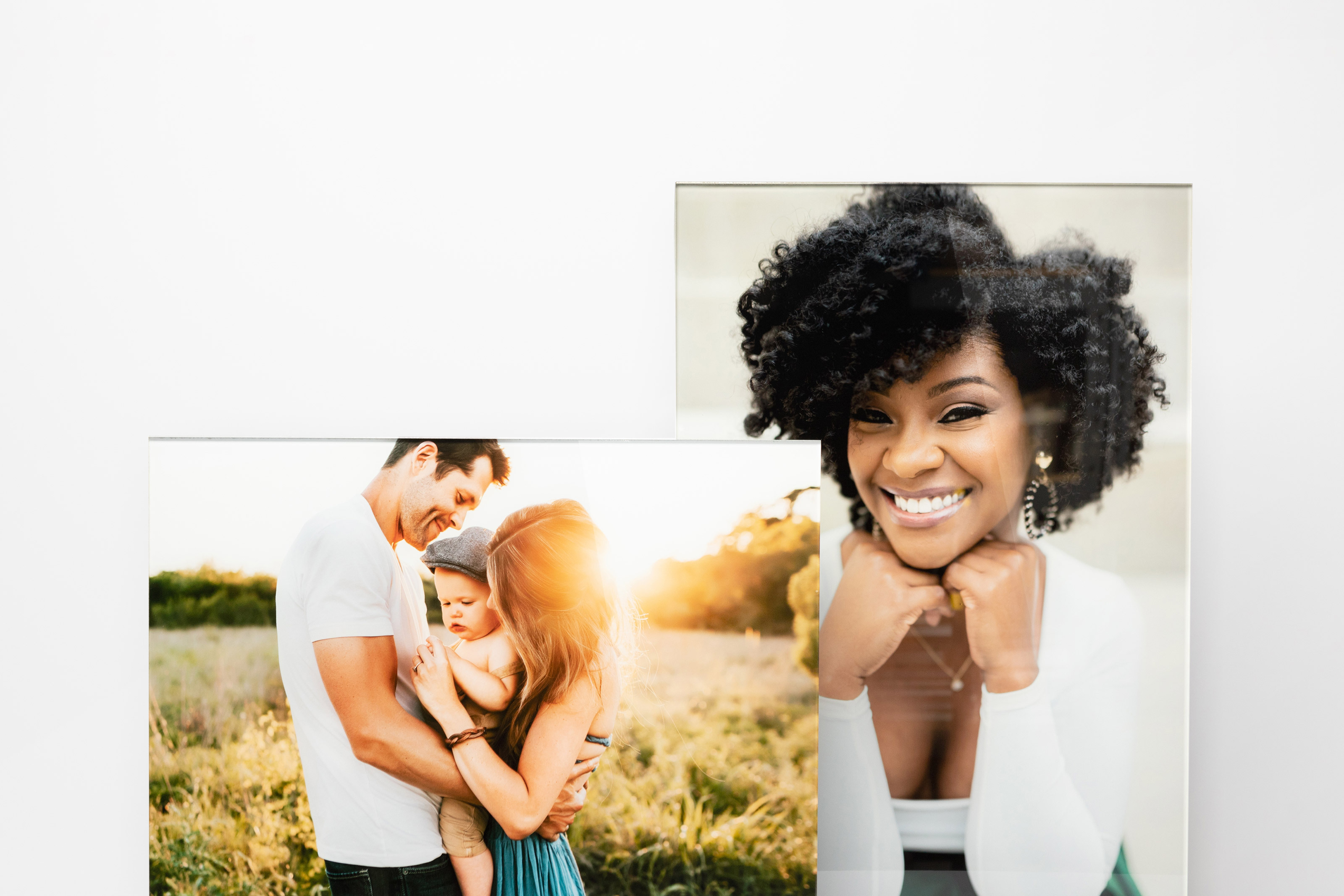 Two Acrylic Prints on a white background featuring professional family photography in a golden light field and headshot portrait photography