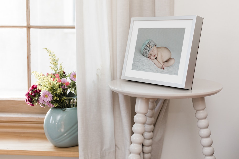 Newborn Framed Tabletop Print on stool