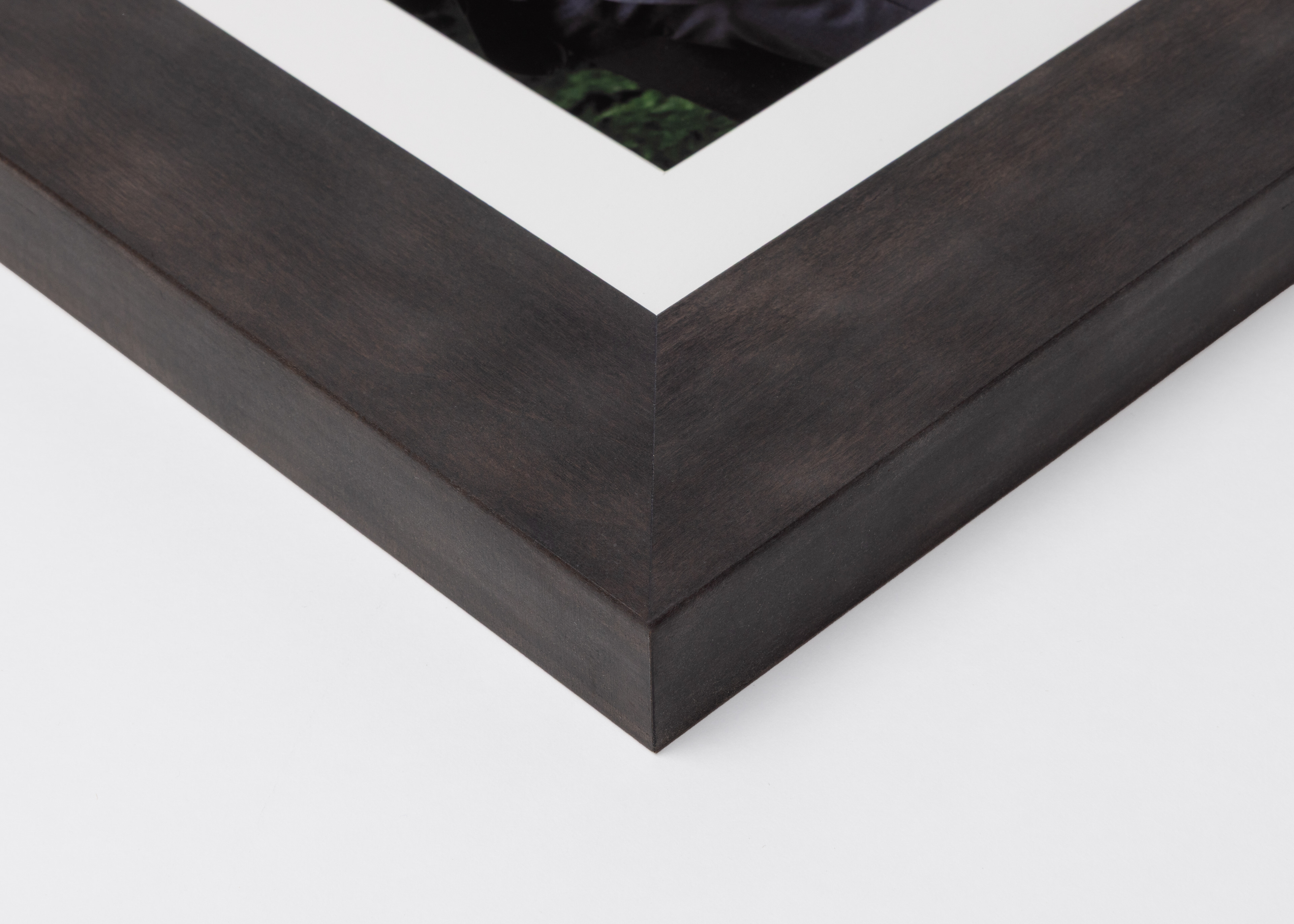 Corner detail of gray Woodland Frame moulding in 2¼" width