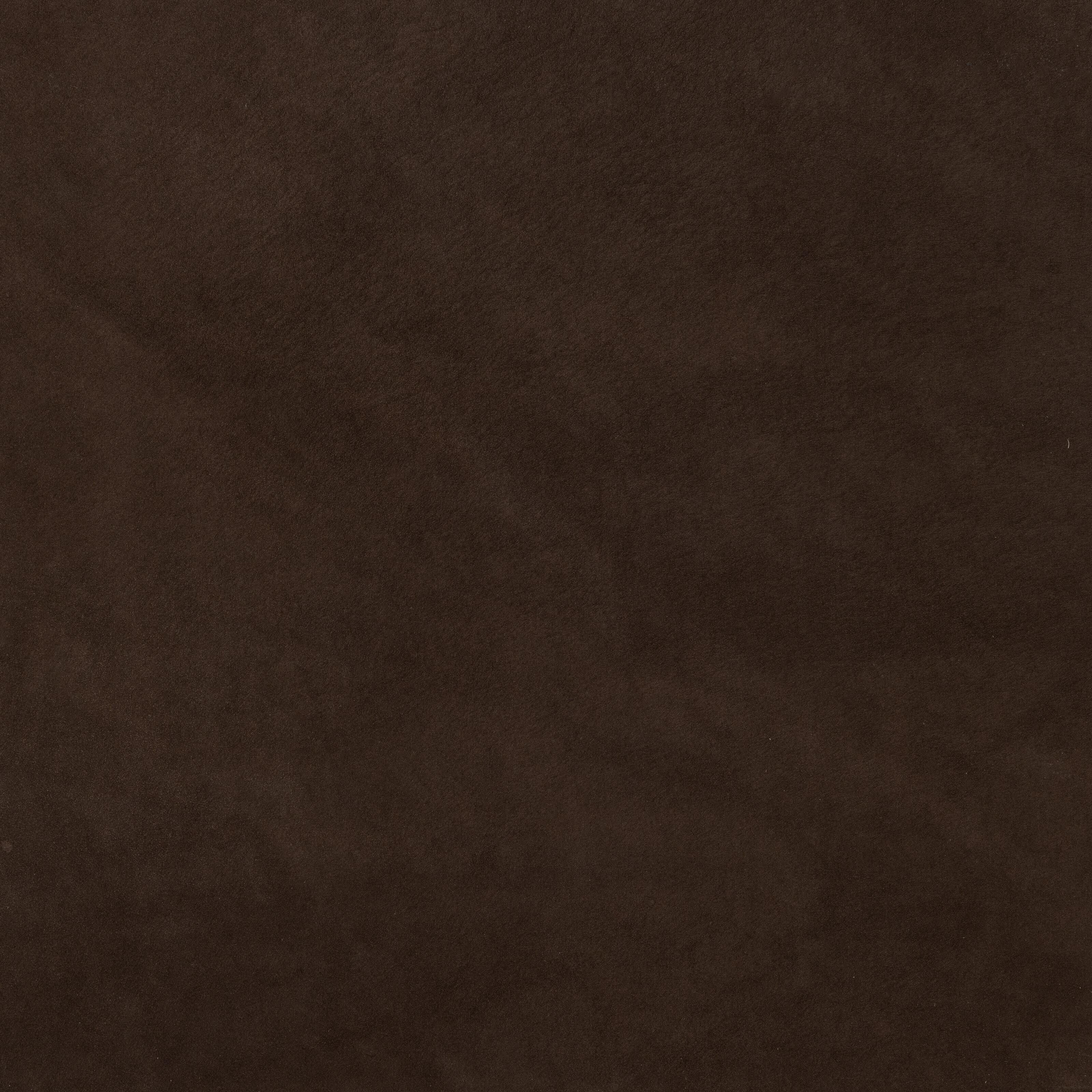 Espresso Nubuck Leather is a warm-toned leather that is soft and smooth to the touch, resembling suede. It is designed for professional use in photo Albums, Books, and Boxes.