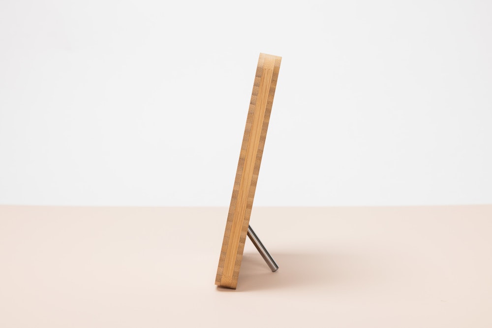 Side view of Removable Metal Stand display hardware on a 5×7 Bamboo Tabletop Frame showing how it slightly leans the frame back