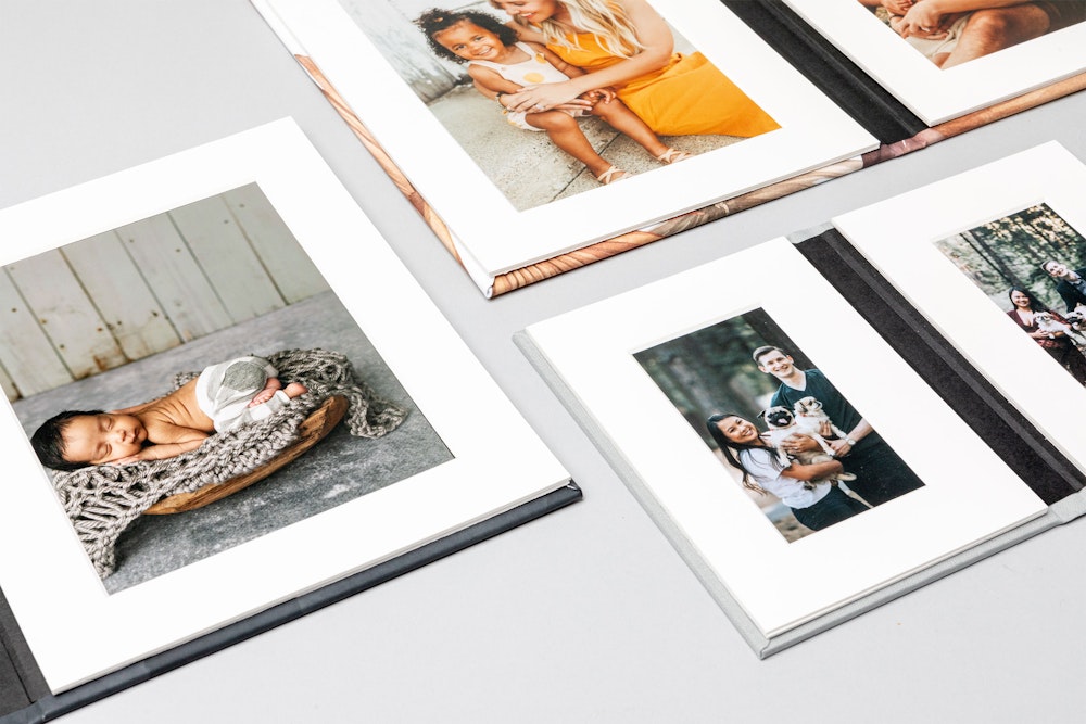 Image Folios with mats lying open