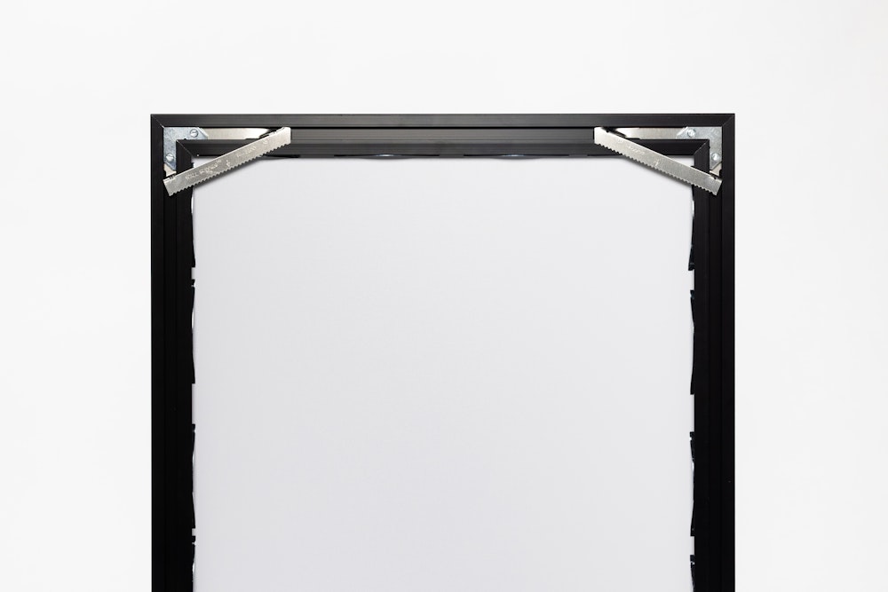 Back of metal moulding Framed Print with Corner Brackets on white background