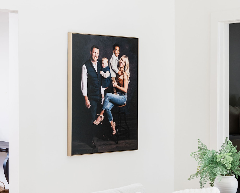 Family portrait in Satin Metal Float Frame on hallway wall in home