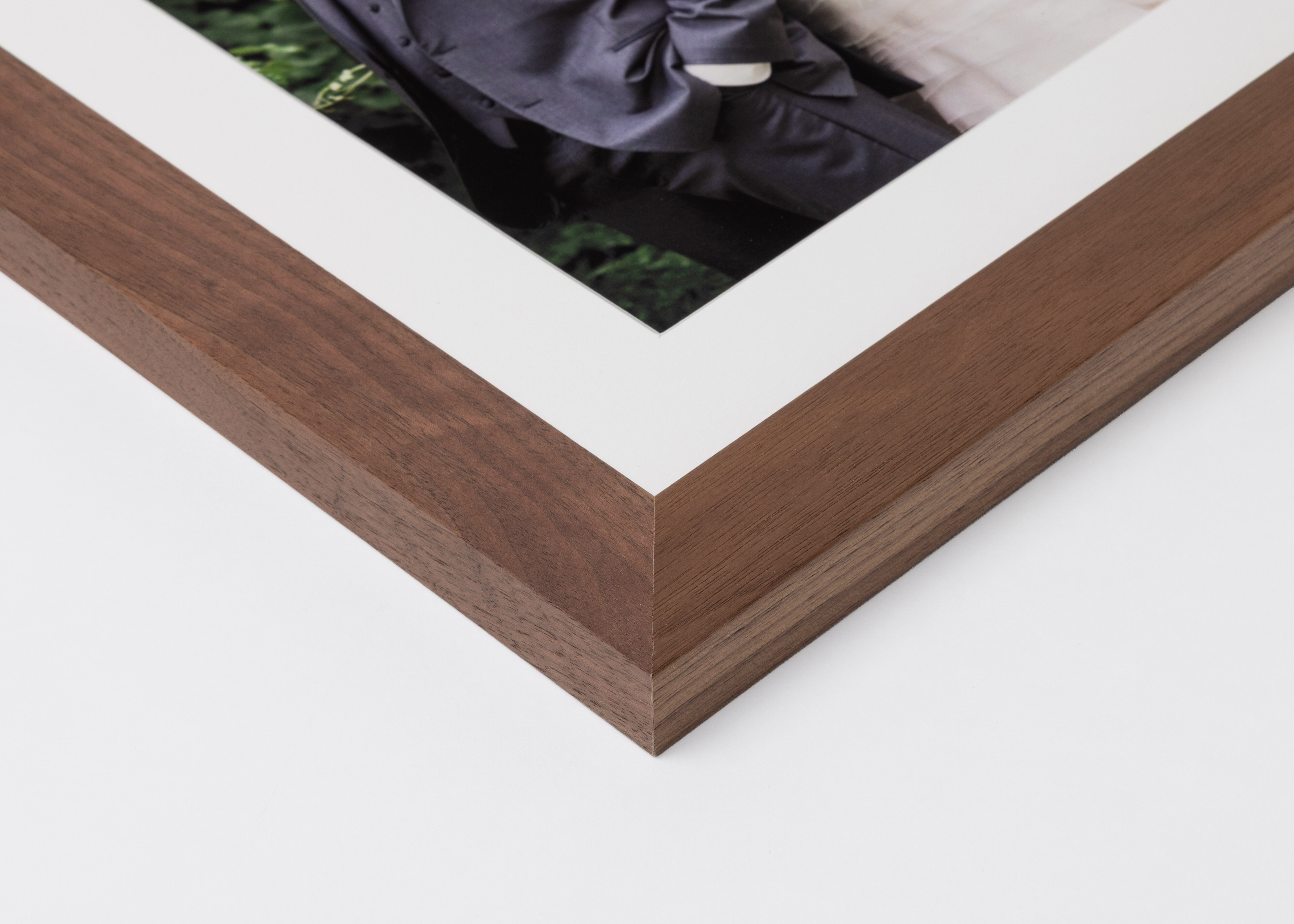 Corner detail of walnut Woodland Frame moulding in 1¼" width