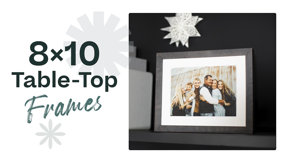 Holiday family portrait in 8x10 Framed Tabletop Print on shelf with snowflake graphics