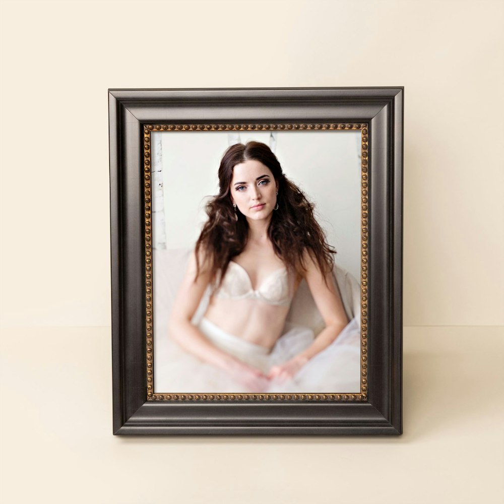 Boudoir Hudson Black and Gold Frame on a cream background