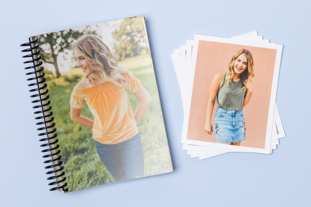 Senior portrait Proof Prints with white boarders and black spiral bound Proofs