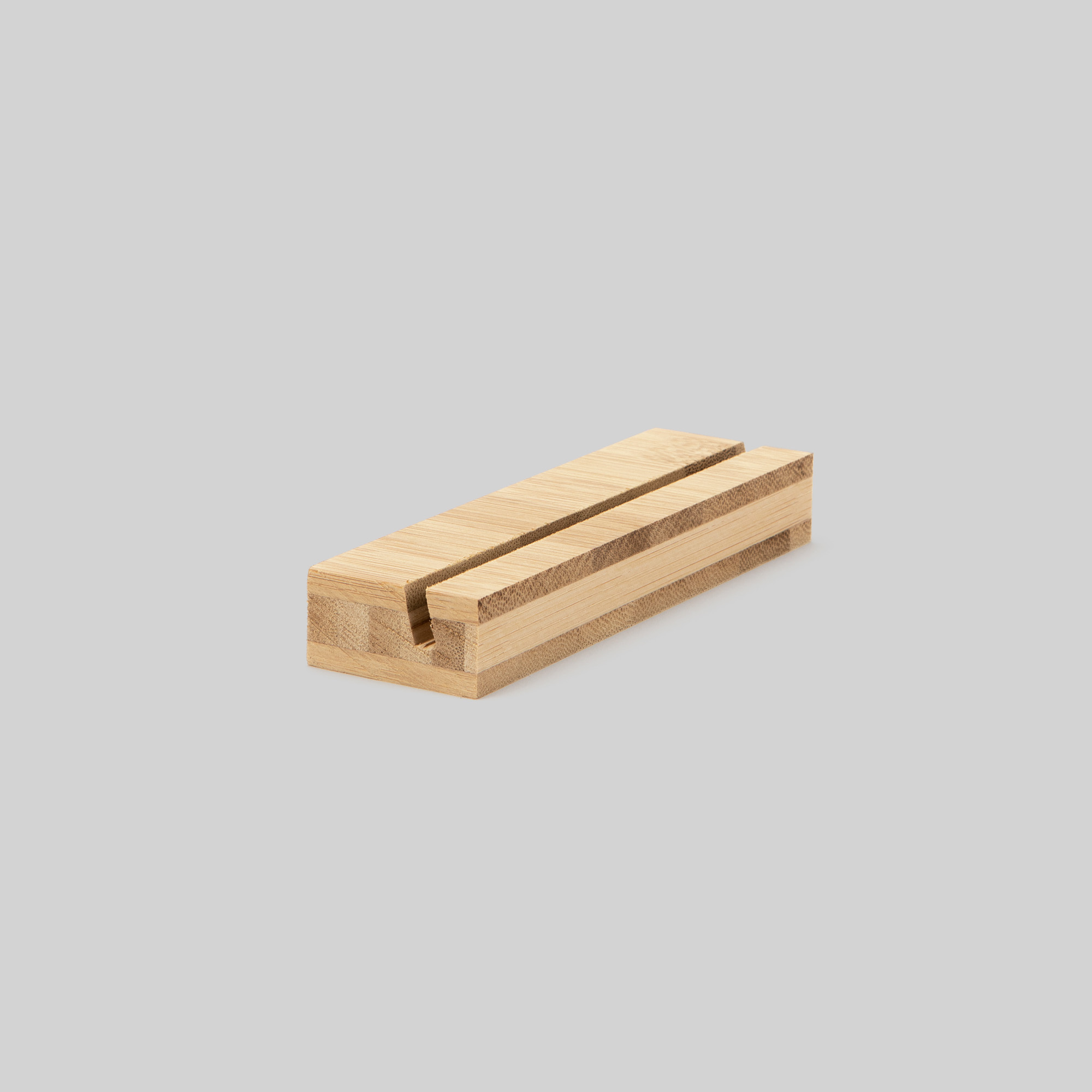 5-inch bamboo Wood Display Stand at an angle on grey background