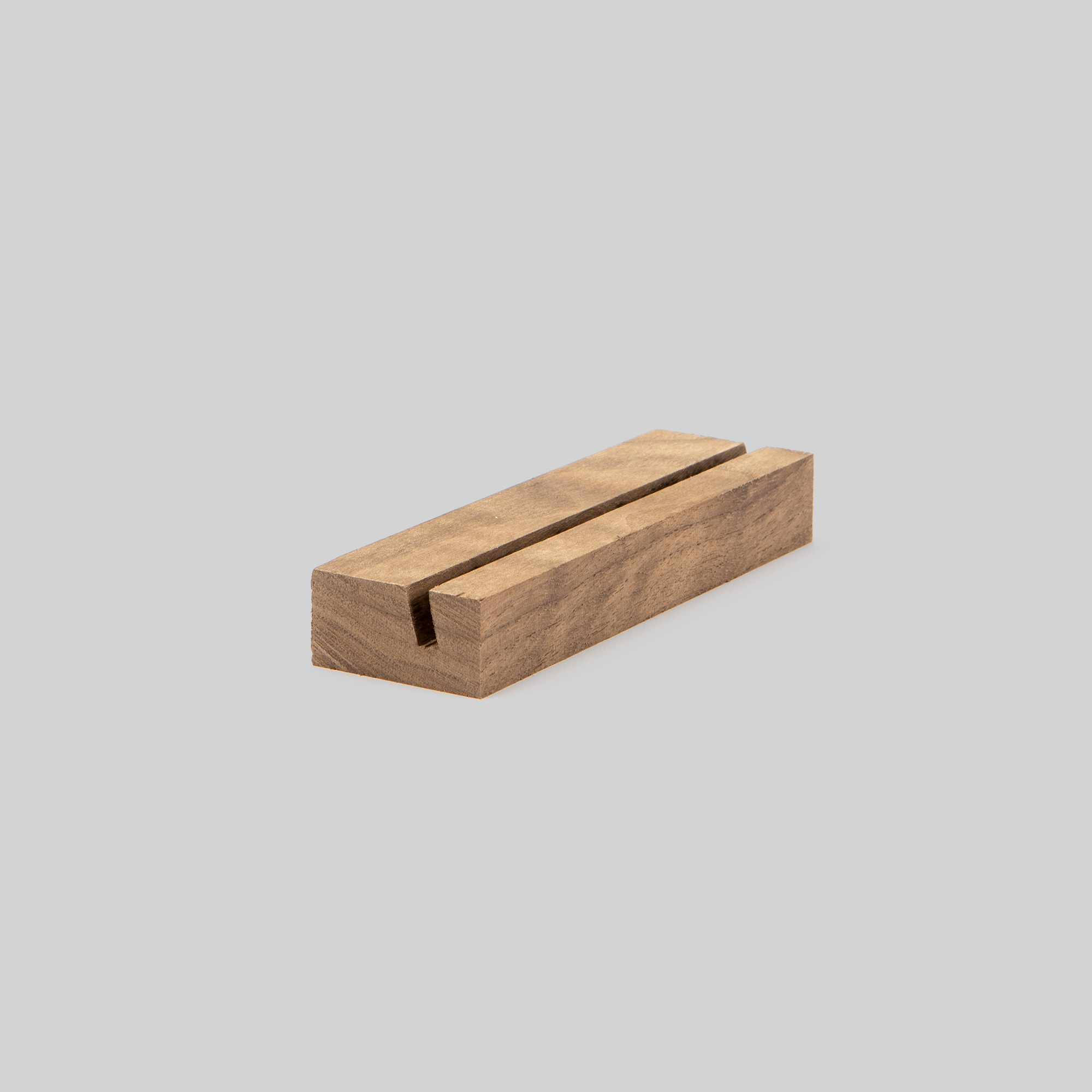 5-inch walnut Wood Display Stand at an angle on grey background