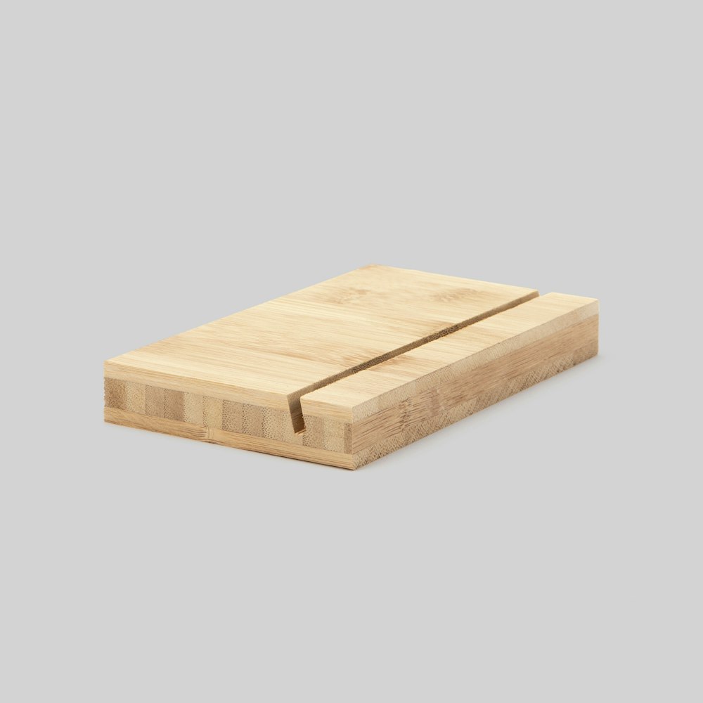 6-inch bamboo Wood Display Stand at an angle on grey background